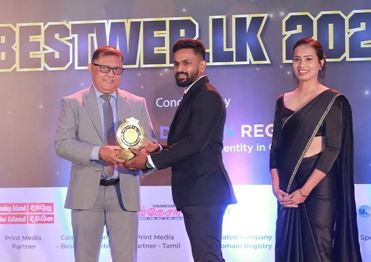 INSCRIPT representative receiving the BestWeb.lk award on stage