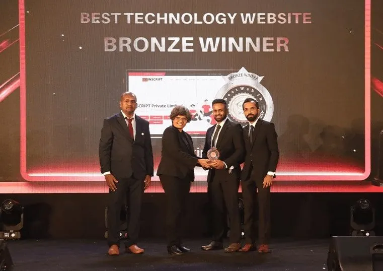 INSCRIPT team accepting a design excellence award